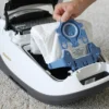 Hand installing Miele GN AirClean Dustbags in a C3 vacuum cleaner