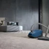 Miele Complete C3 PowerLine Petrol Blue canister vacuum cleaner full view