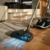 Miele Complete C3 vacuum cleaner on hardwood floor - Appliances Nest